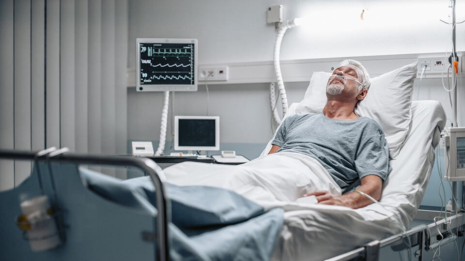 stroke patient in hospital bed